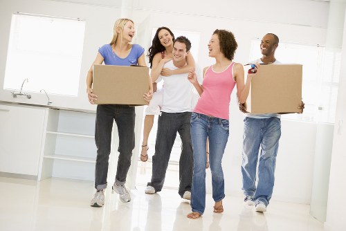 Professional packing team preparing household items in Walworth