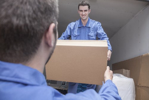 Removal van and moving boxes prepared for a home move in Walworth