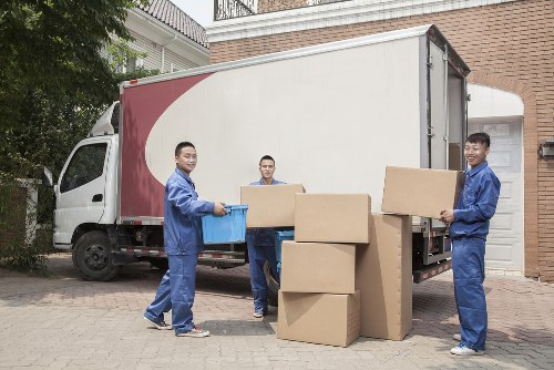 Professional movers handling household items with care