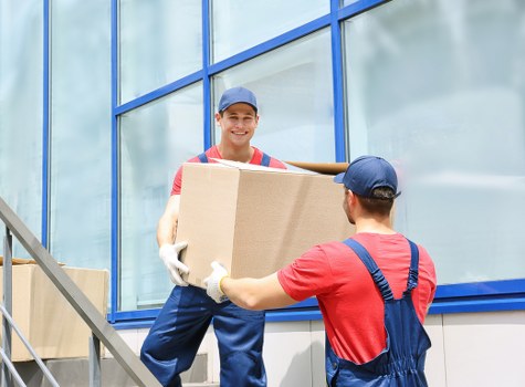 Removal van and boxes during a local move in Walworth