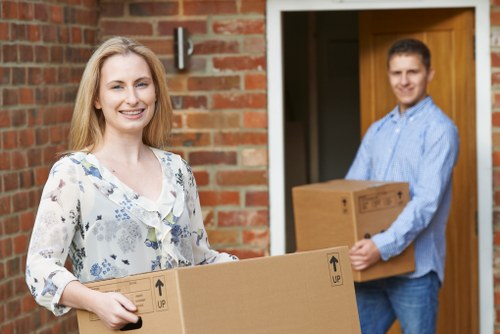 Packed office boxes and furniture ready for transport