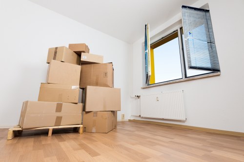 Furniture and boxes being loaded by professional movers