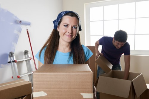 Furniture removal team loading bulky household items in Walworth
