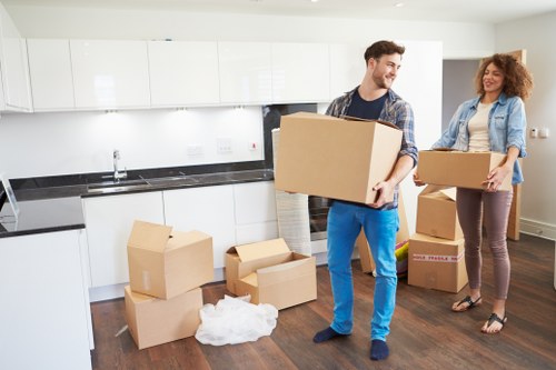Professional movers navigating a South London street in Walworth